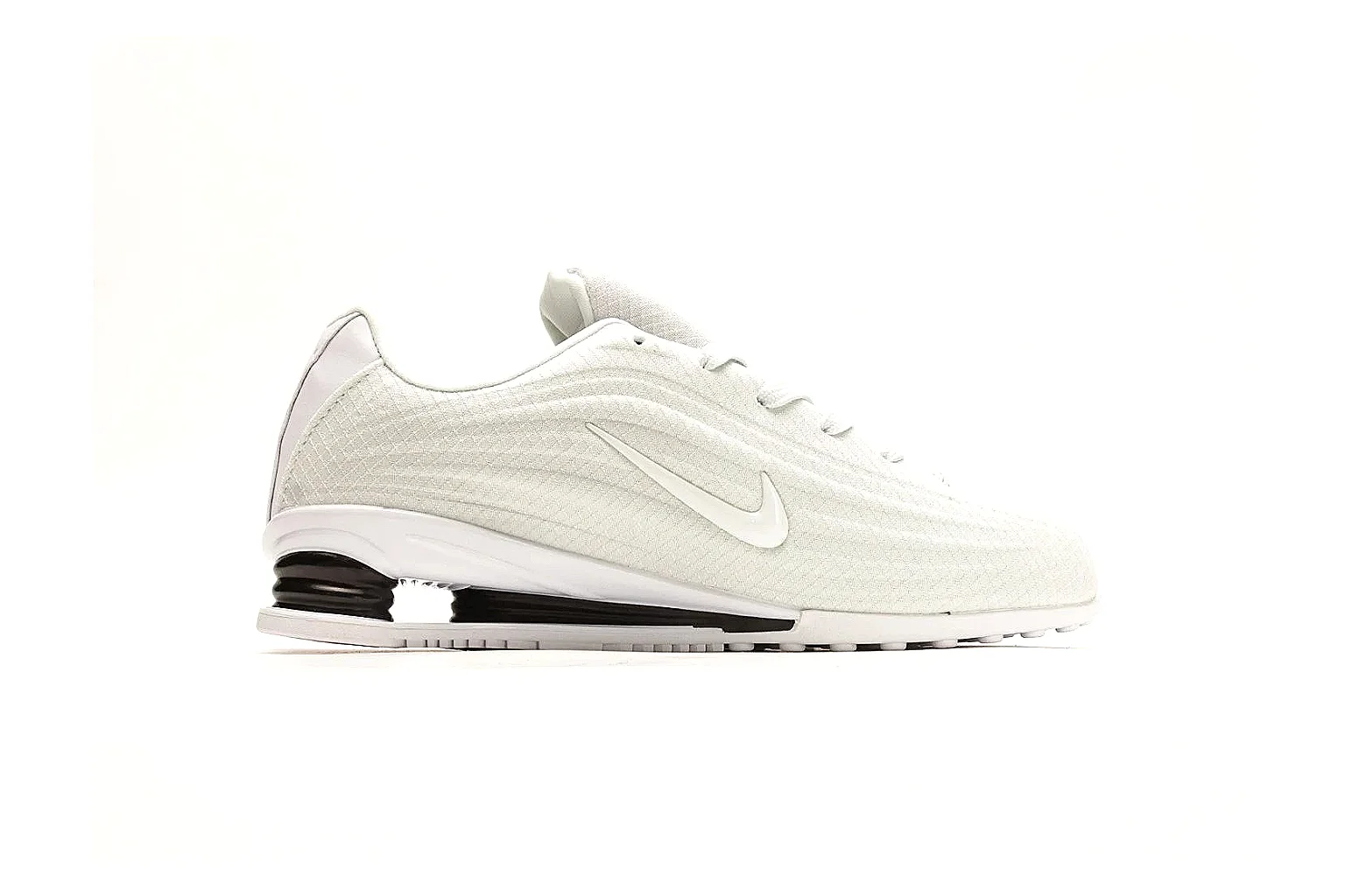 Nike Shox Z White Sneakers QC reference photo showing white streamlined layered upper, small Swoosh, black heel cushioning columns, and modern low runner shape thumbnail 5