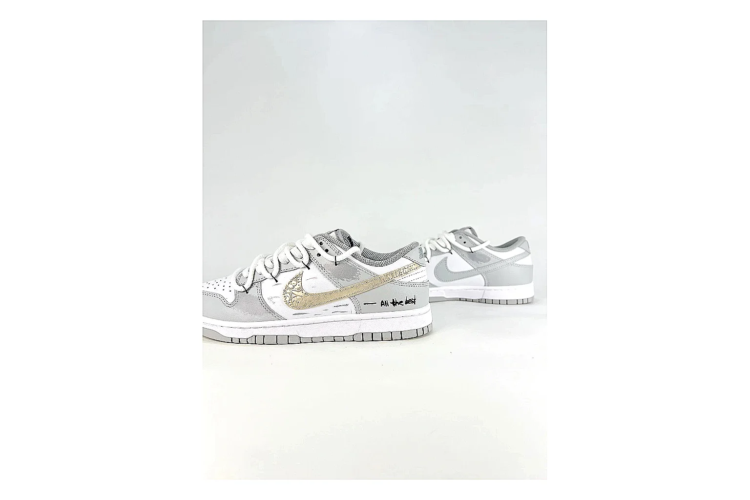 Nike Silver Runner Silver Gold QC reference photo showing silver synthetic-mesh upper, gold accent details, modern runner shape, and cushioned sole