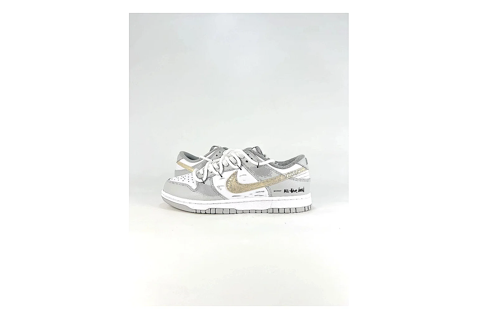 Nike Silver Runner Silver Gold QC reference photo showing silver synthetic-mesh upper, gold accent details, modern runner shape, and cushioned sole thumbnail 5