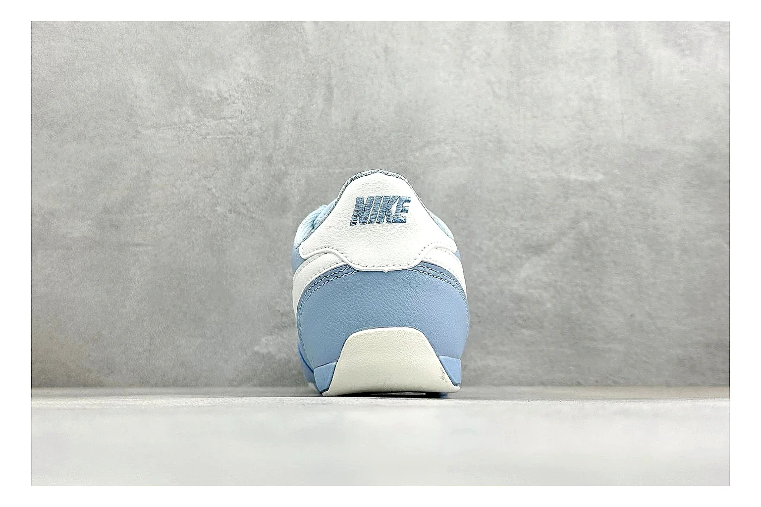 Nike Sprint Sister Light Blue QC reference photo showing light blue retro-runner upper, slim side profile, tonal panels, and low everyday sole