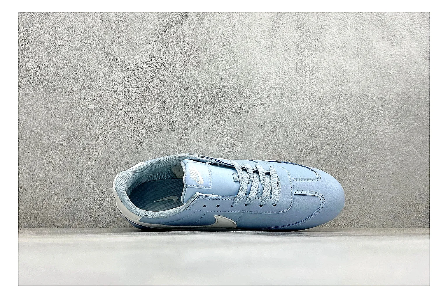 Nike Sprint Sister Light Blue QC reference photo showing light blue retro-runner upper, slim side profile, tonal panels, and low everyday sole thumbnail 6