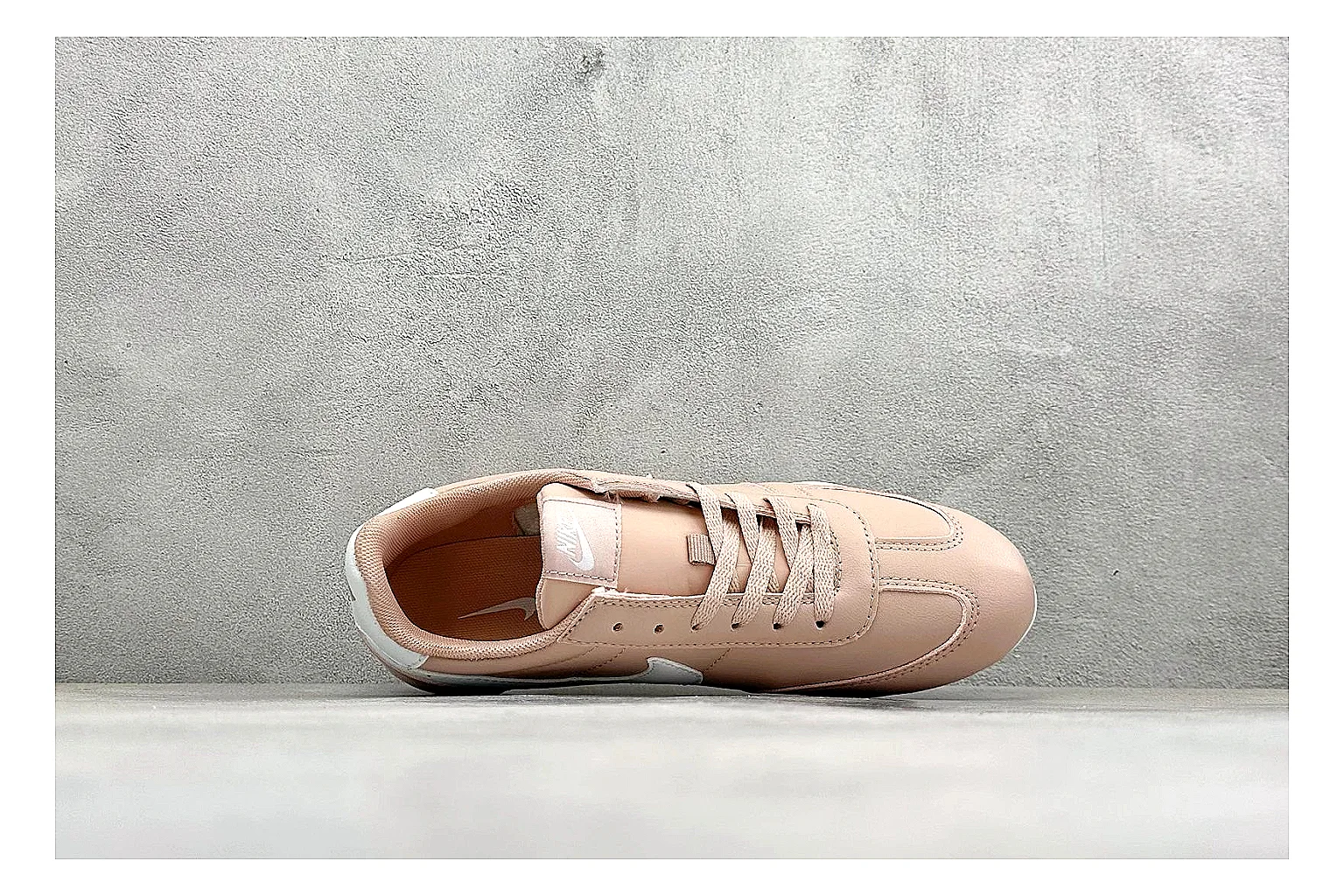 Nike Sprint Sister Pink QC reference photo showing soft pink retro-runner upper, slim side profile, low collar, and light casual sole thumbnail 6