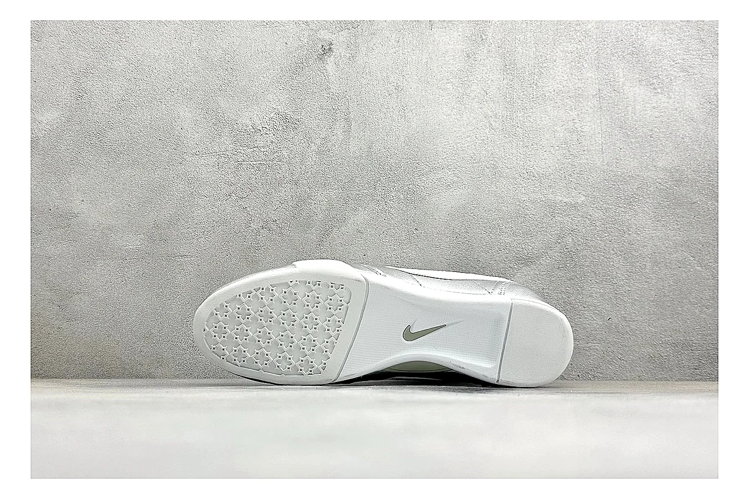 Nike Sprint Sister Silver QC reference photo showing silver retro-runner upper, slim low-top shape, layered side panels, and a light everyday sole thumbnail 3