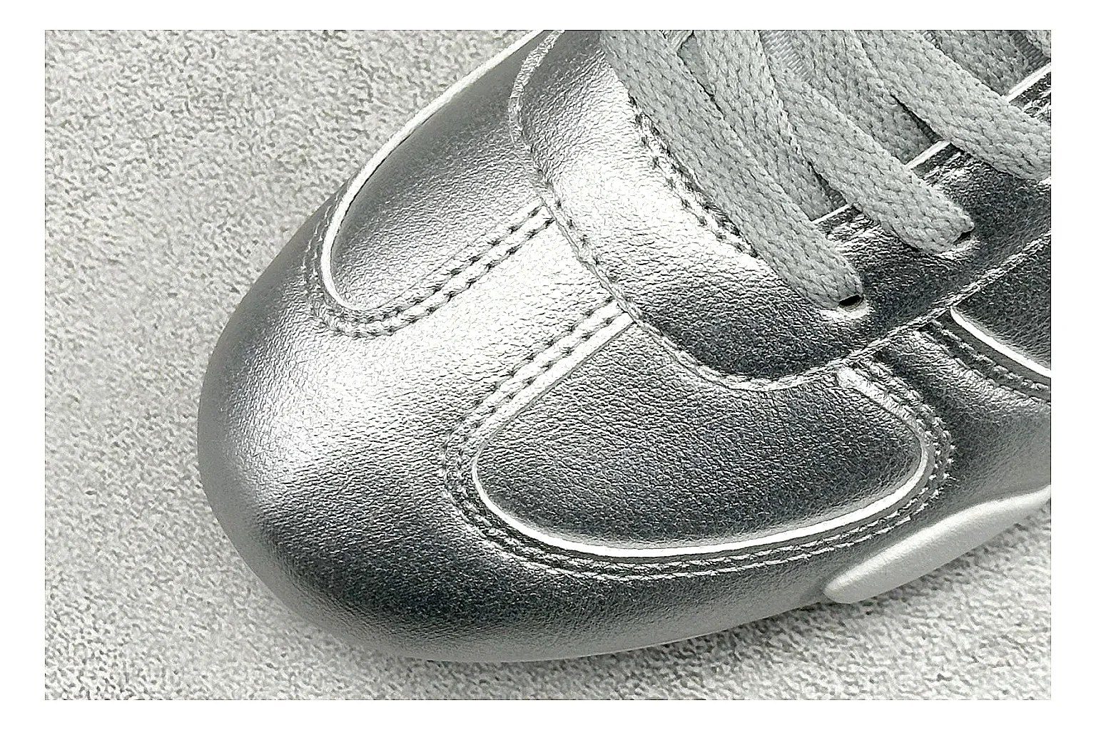 Nike Sprint Sister Silver QC reference photo showing silver retro-runner upper, slim low-top shape, layered side panels, and a light everyday sole thumbnail 4