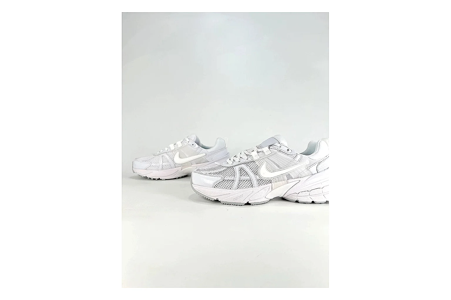 Nike V2K Run White Sneakers QC photo reference showing white retro runner sneakers with mesh-leather texture, side-profile shape, upper panel lines, and outsole detail thumbnail 4