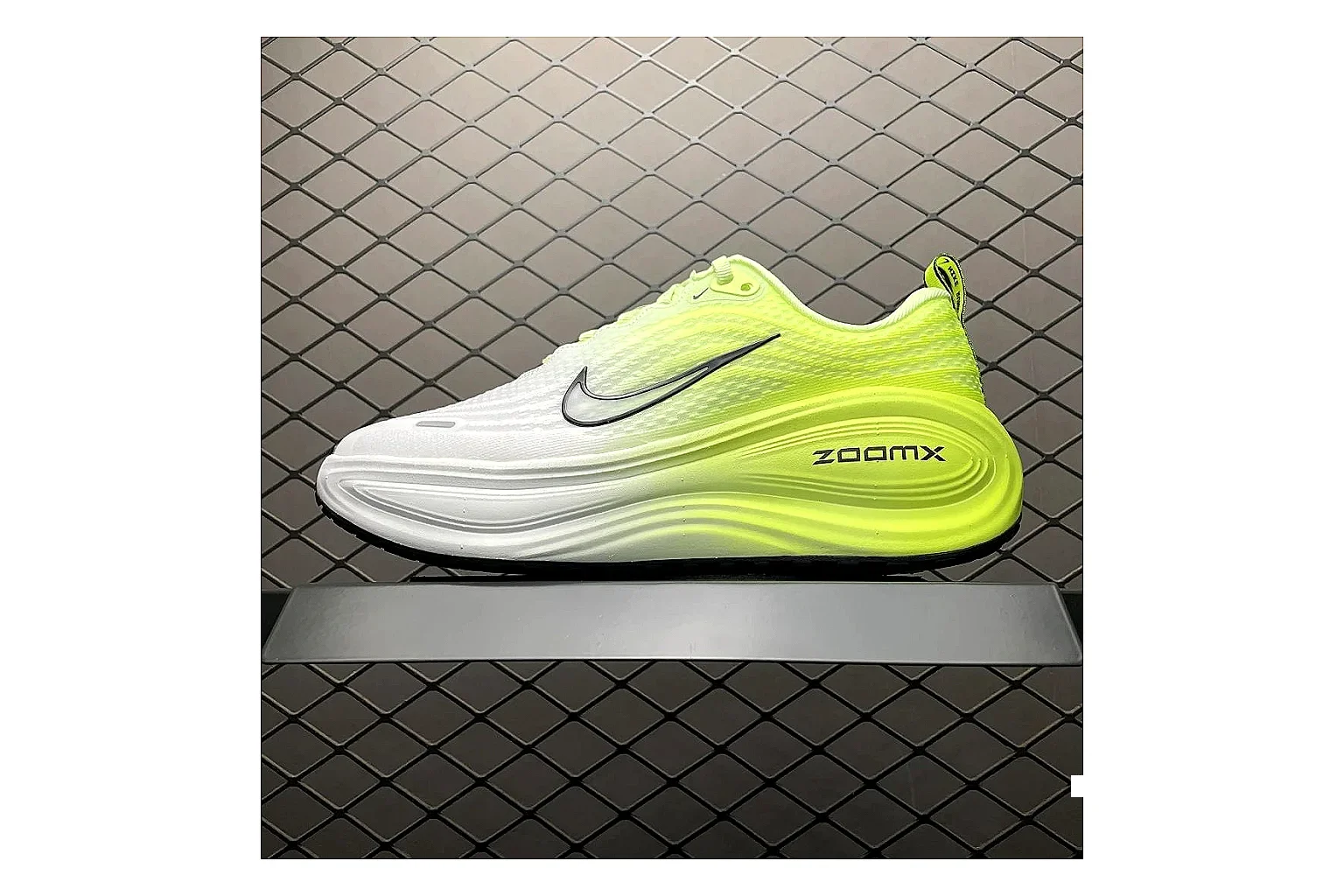 Nike Vomero Plus Volt White QC photo showing white volt vomero plus runner with mixed upper and runner shape