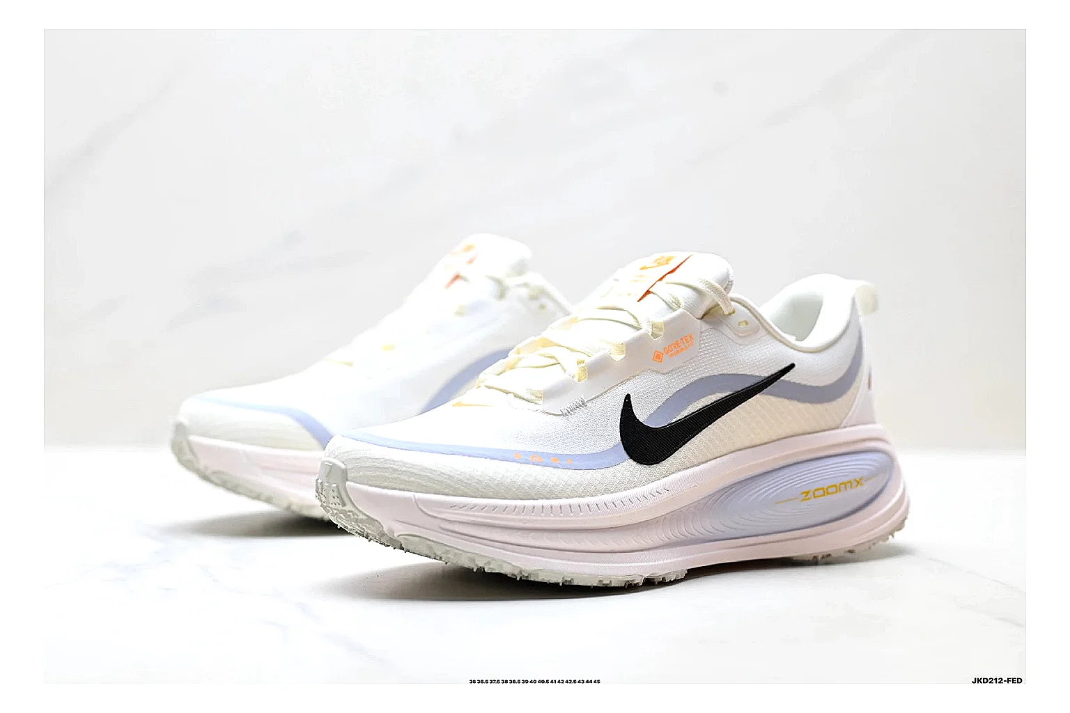 Nike Vomero White Orange QC reference photo showing white mesh runner upper, orange accents, layered Vomero-style panels, and cushioned modern sole thumbnail 3