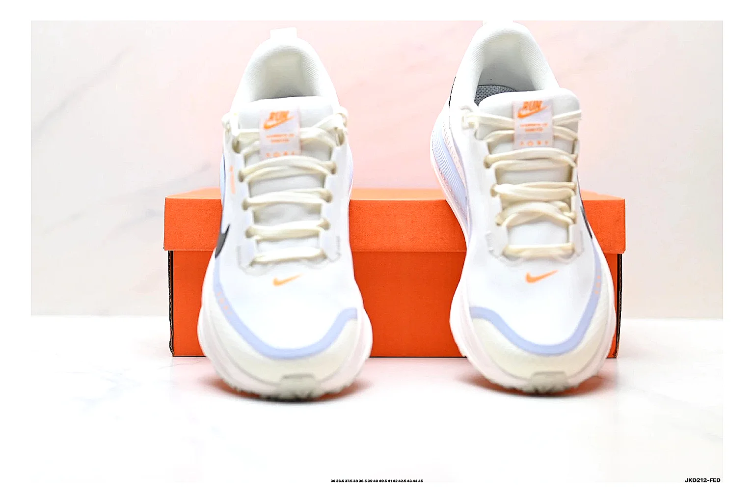Nike Vomero White Orange QC reference photo showing white mesh runner upper, orange accents, layered Vomero-style panels, and cushioned modern sole thumbnail 4