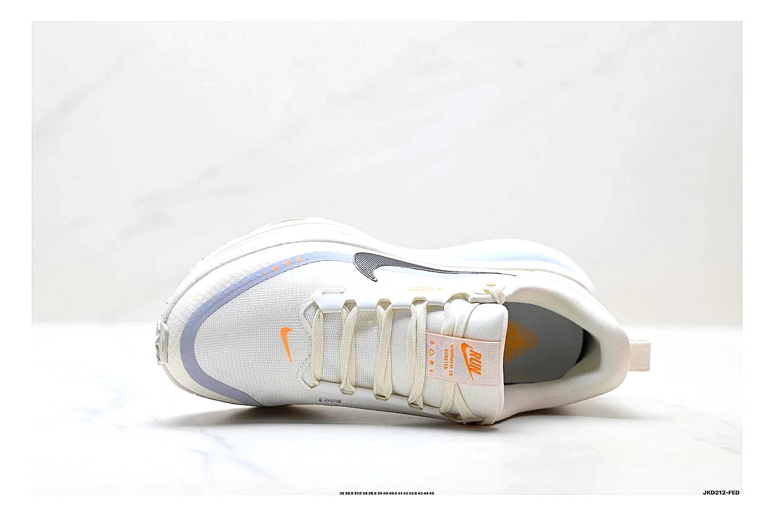 Nike Vomero White Orange QC reference photo showing white mesh runner upper, orange accents, layered Vomero-style panels, and cushioned modern sole thumbnail 5