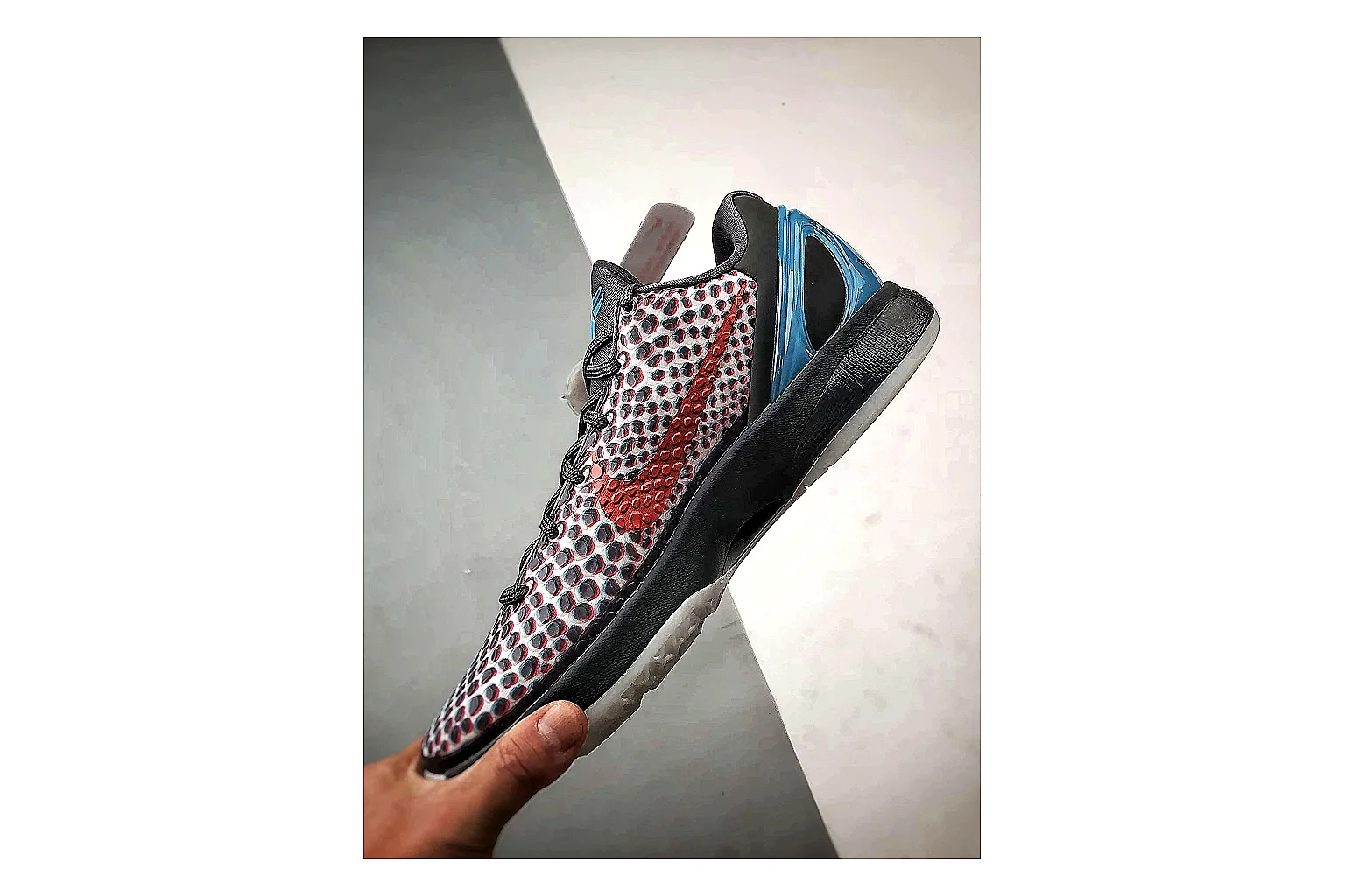 Nike Woven Runner Gray Teal QC reference photo showing gray woven-mesh runner upper, teal accent details, modern runner shape, and cushioned sole
