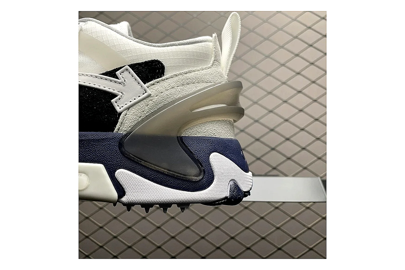 Off-White Out Of Office White Navy QC photo showing white navy out-of-office low-top with mixed upper and low top shape thumbnail 2