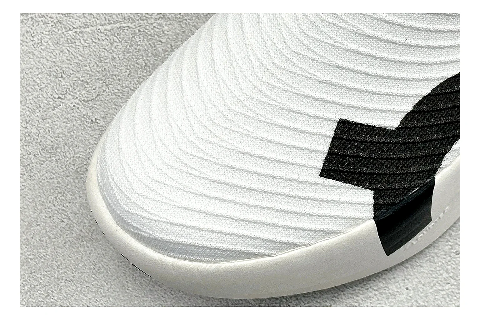 On Cloudboom White Black QC reference photo showing white performance mesh, black contrast details, slim racing profile, and segmented CloudTec sole thumbnail 4