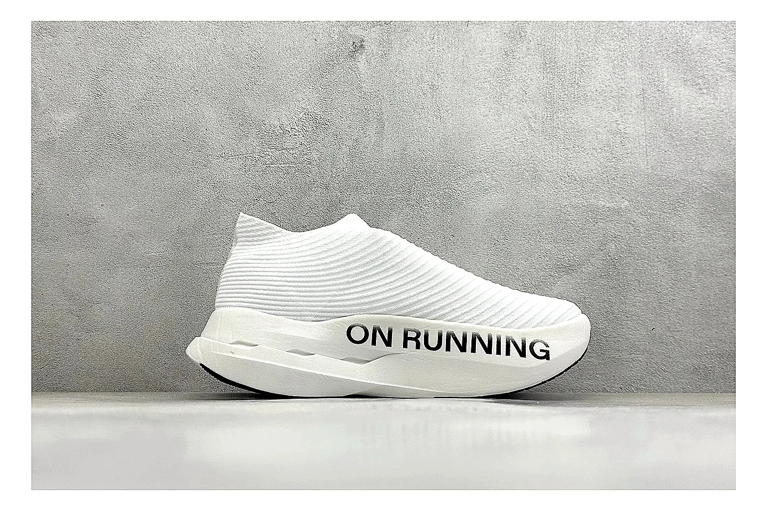 On Cloudboom White Black QC reference photo showing white performance mesh, black contrast details, slim racing profile, and segmented CloudTec sole thumbnail 5