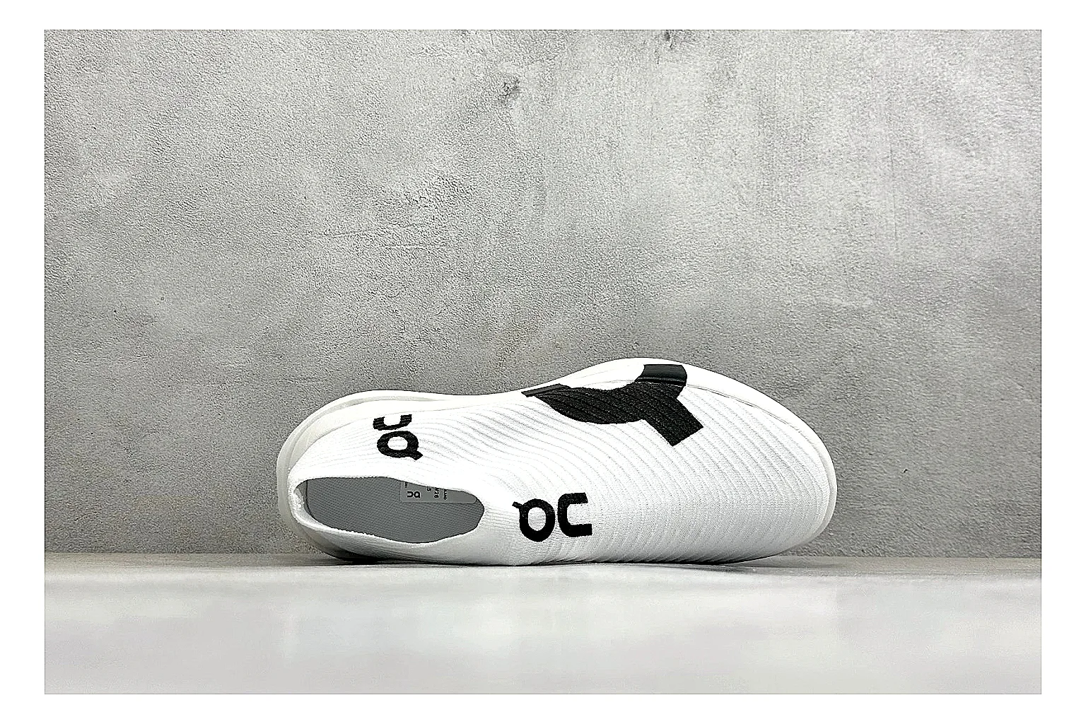 On Cloudboom White Black QC reference photo showing white performance mesh, black contrast details, slim racing profile, and segmented CloudTec sole thumbnail 6