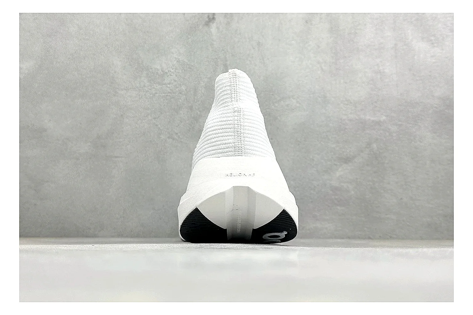 On Cloudboom White Blue QC reference photo showing white performance mesh, blue gradient accents, slim racing profile, and segmented CloudTec sole