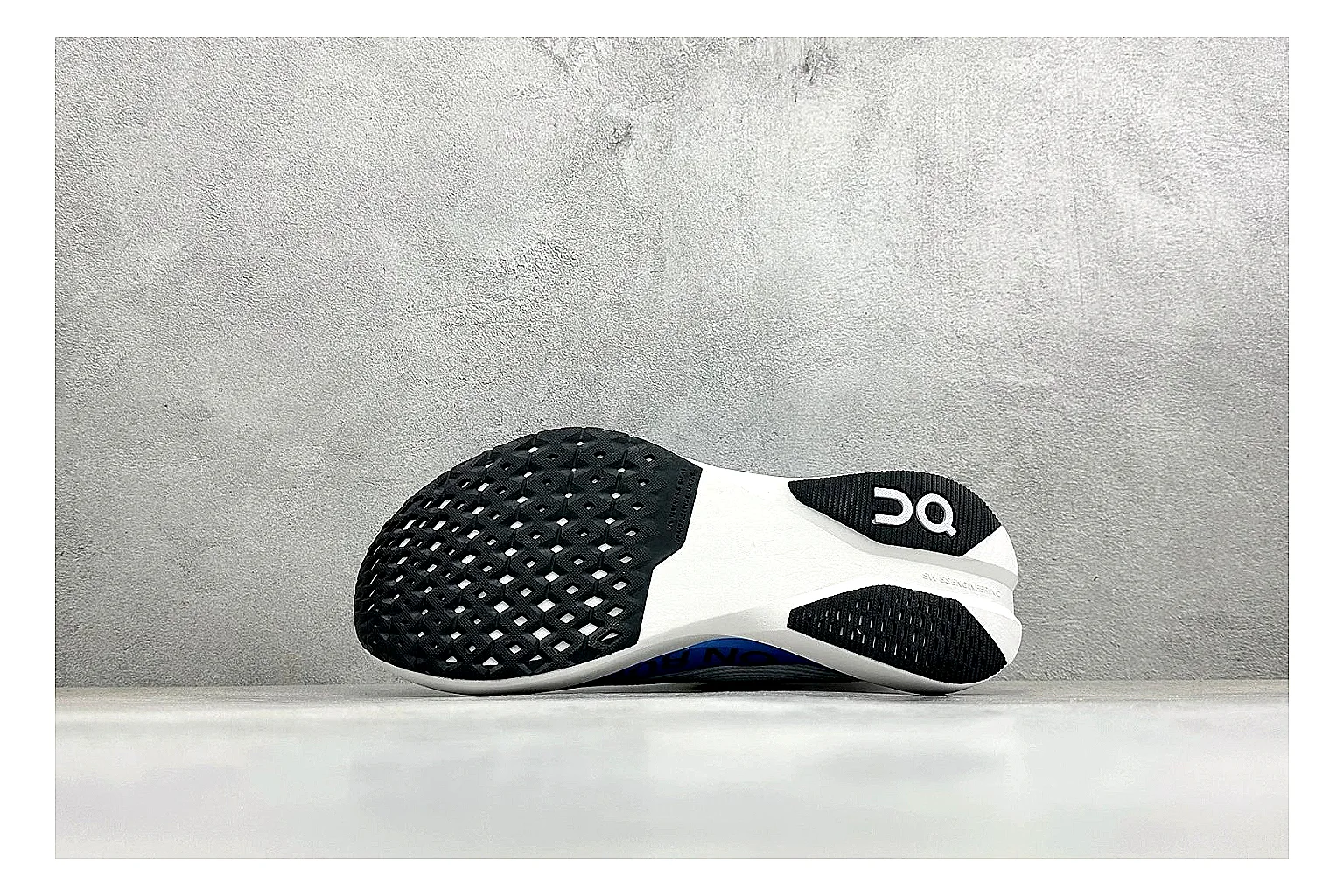 On Cloudboom White Blue QC reference photo showing white performance mesh, blue gradient accents, slim racing profile, and segmented CloudTec sole thumbnail 3