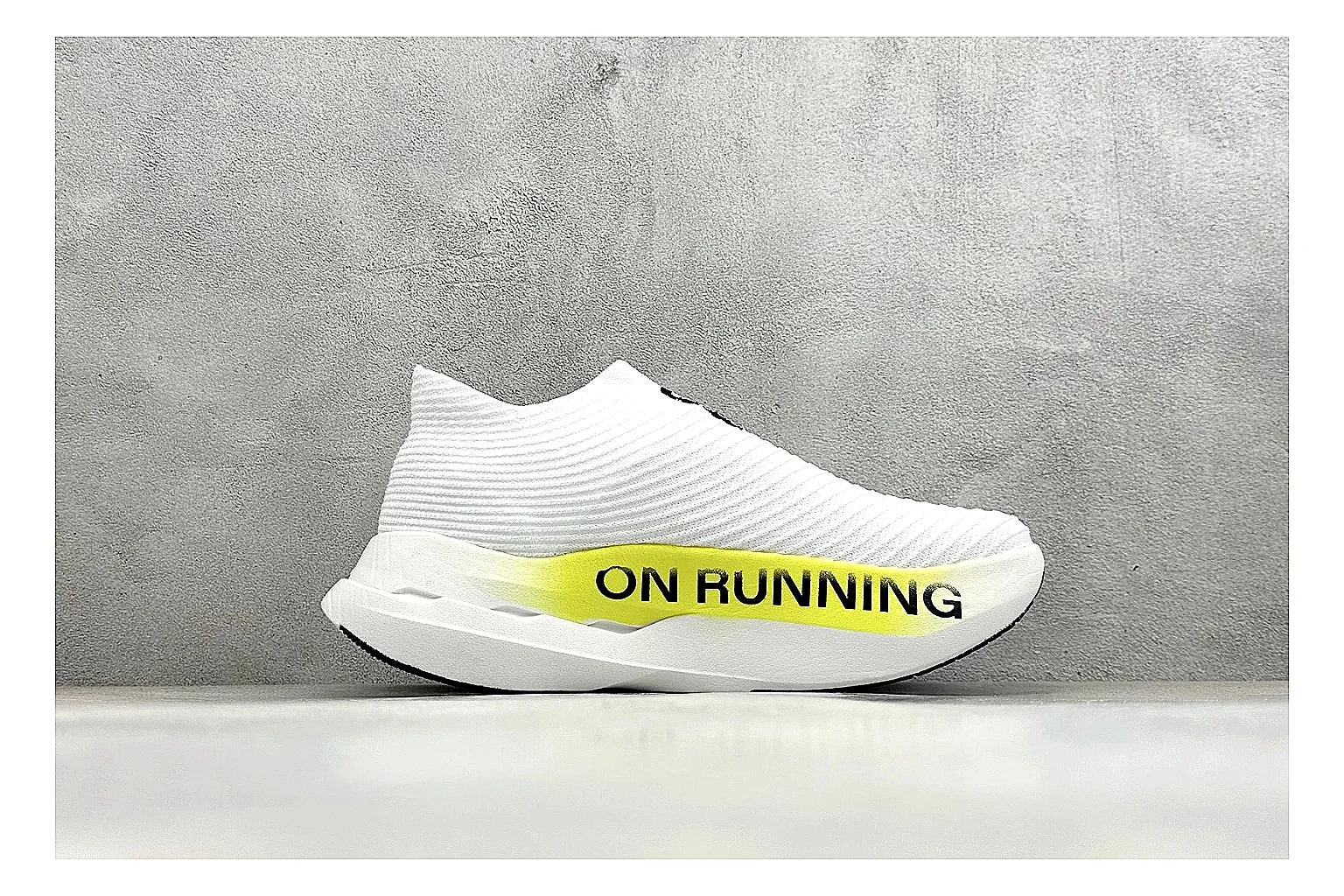 On Cloudboom White Lime QC reference photo showing white performance mesh, lime gradient accents, slim racing profile, and segmented CloudTec sole thumbnail 5