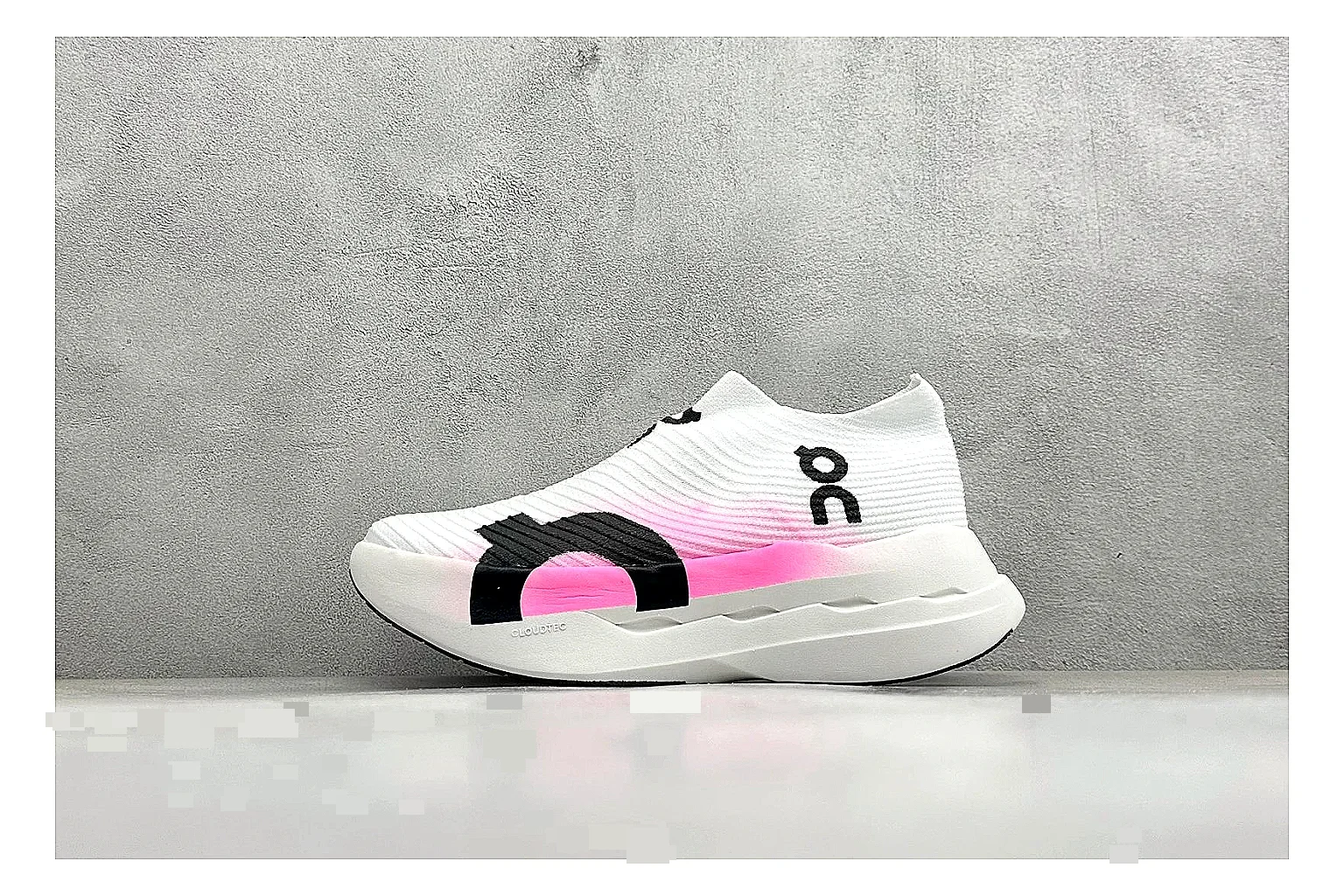 On Cloudboom White Pink QC reference photo showing white running mesh, pink gradient accents, low racing shape, and segmented CloudTec sole