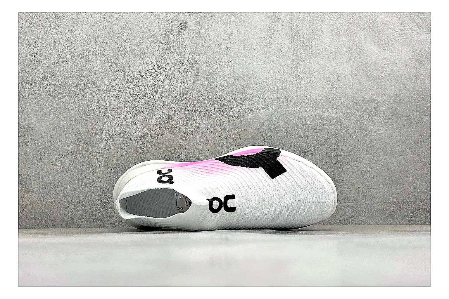 On Cloudboom White Pink QC reference photo showing white running mesh, pink gradient accents, low racing shape, and segmented CloudTec sole thumbnail 6