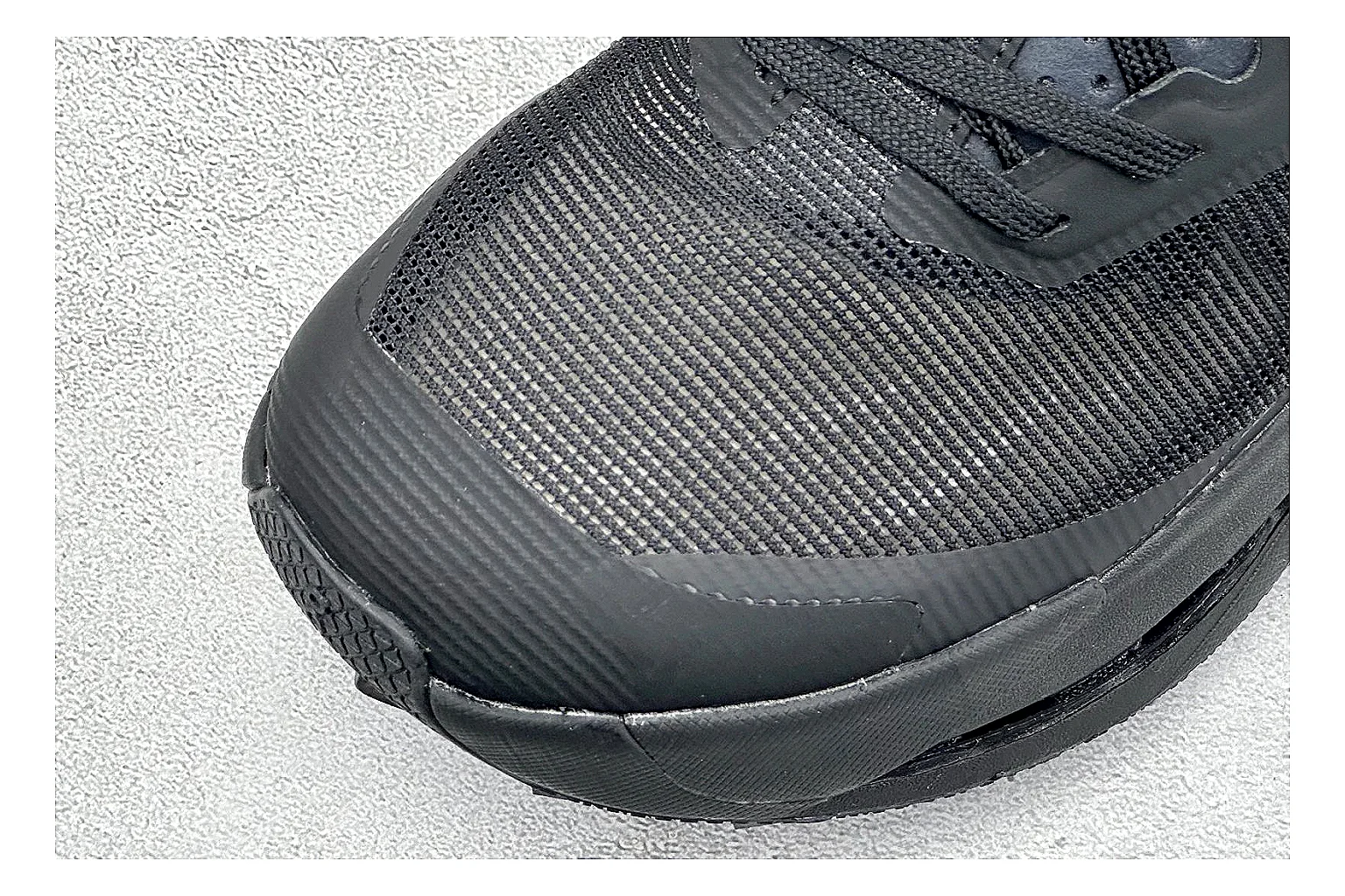 On Cloudmonster Triple Black QC reference photo showing triple black mesh upper, oversized CloudTec sole pods, tonal laces, and rounded runner shape thumbnail 4