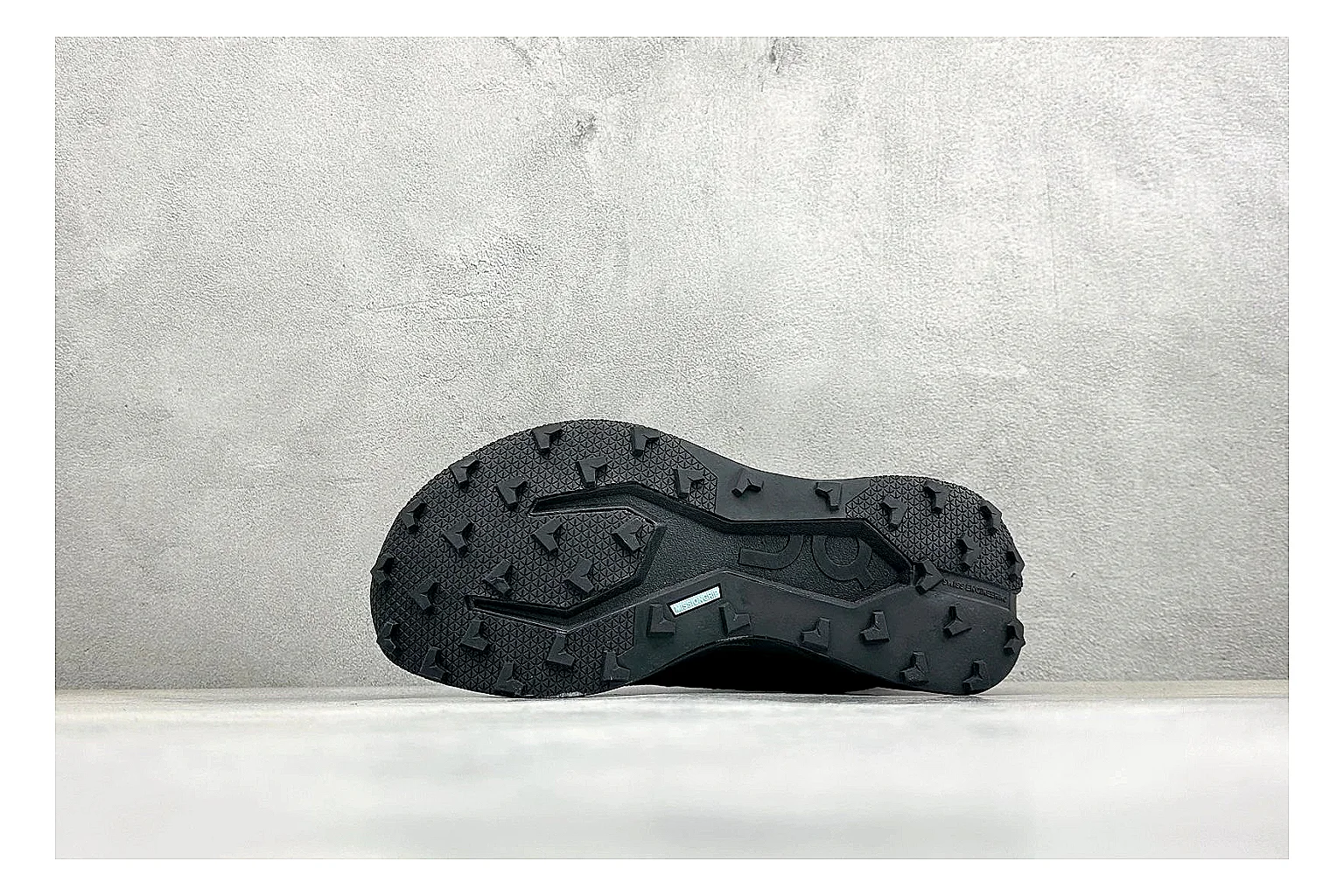 On Cloudmonster Triple Black QC reference photo showing triple black running upper, oversized CloudTec pod sole, tonal laces, and rounded performance shape thumbnail 3
