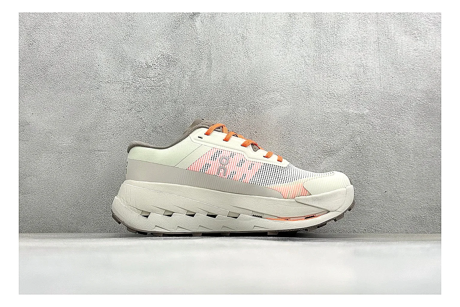 On Cloudmonster White Orange QC reference photo showing white running mesh, orange accent hits, oversized CloudTec sole pods, and a rounded runner silhouette thumbnail 5