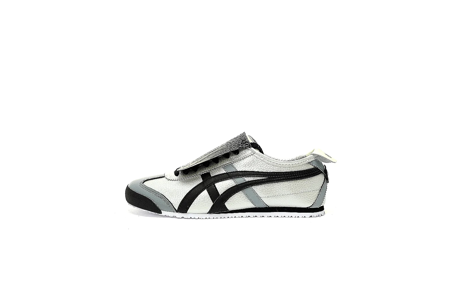 Six-angle QC gallery of white black low-tops with textured flaps and patterned rubber outsole thumbnail 2