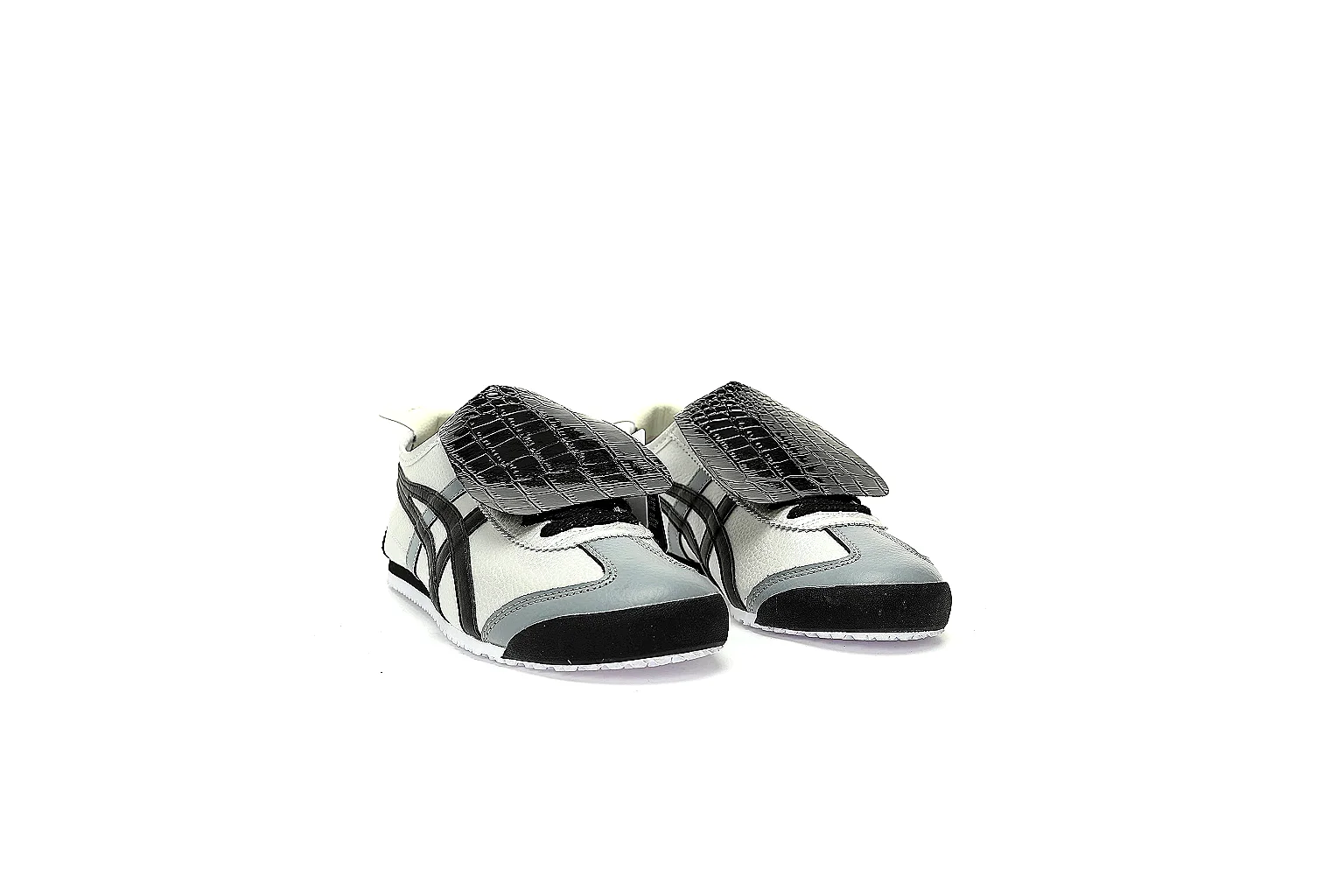 Six-angle QC gallery of white black low-tops with textured flaps and patterned rubber outsole thumbnail 4