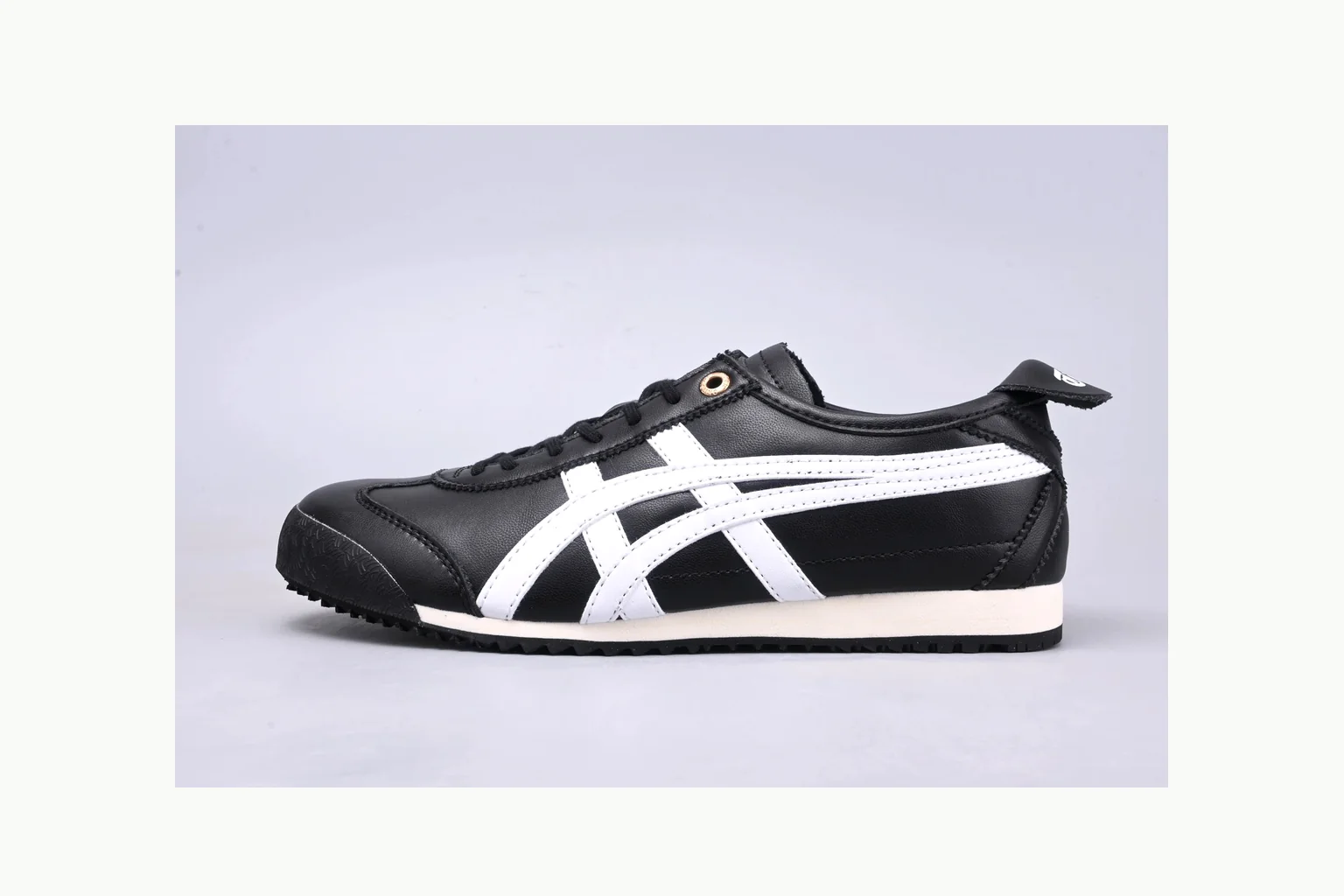 Onitsuka Tiger Black White Sneaker QC photo showing white black onitsuka tiger with mixed upper and low top shape