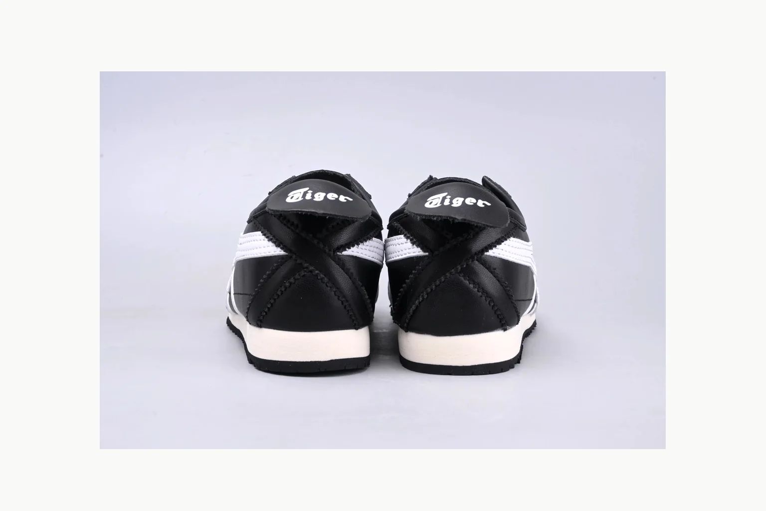 Onitsuka Tiger Black White Sneaker QC photo showing white black onitsuka tiger with mixed upper and low top shape thumbnail 2