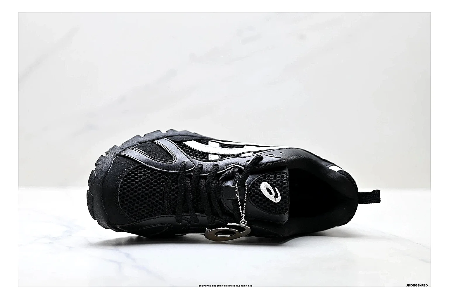 Onitsuka Tiger Gel-Tru Black White Sneakers QC photo reference showing black white trail runner sneakers with mesh-leather texture, side-profile shape, upper panel lines, and outsole detail thumbnail 6