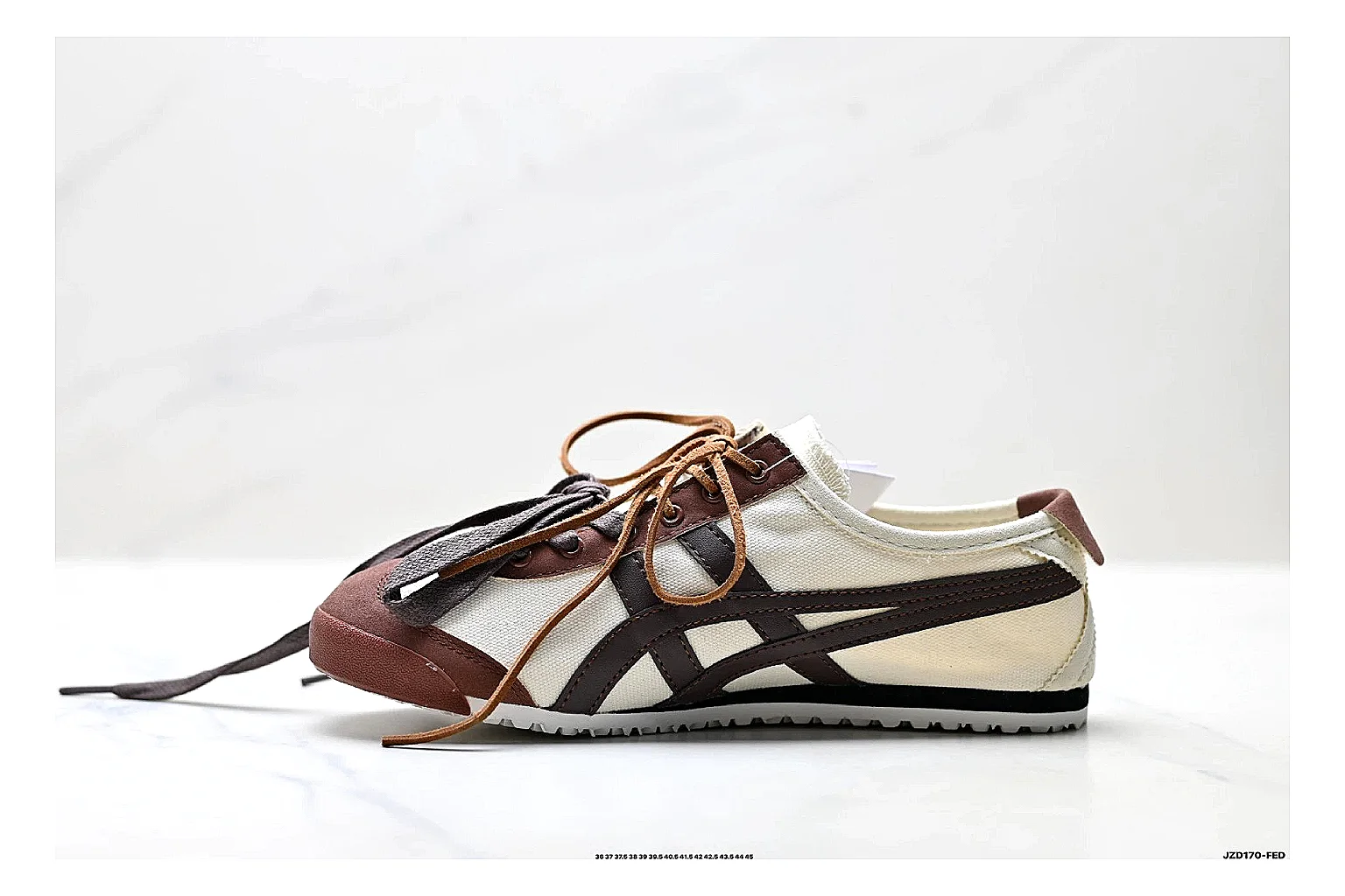 Onitsuka Tiger Mexico 66 Brown Cream Sneakers QC photo reference showing brown cream low-top sneakers with leather texture, side-profile shape, upper panel lines, and outsole detail thumbnail 5