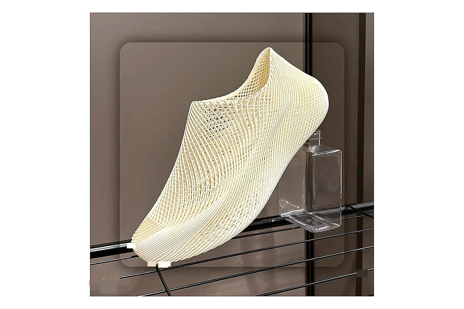 Other 4D Printed Cream Slip-On Sneakers QC reference photo showing cream open-grid upper, seamless slip-on profile, sculpted sole, and soft futuristic casual shape