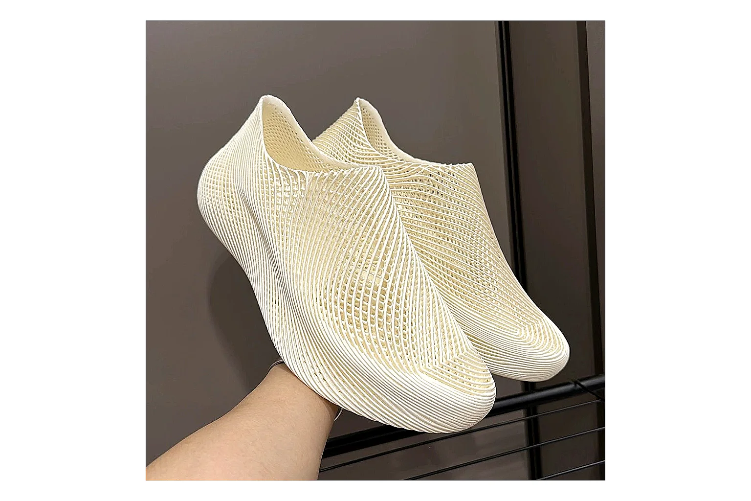 Other 4D Printed Cream Slip-On Sneakers QC reference photo showing cream open-grid upper, seamless slip-on profile, sculpted sole, and soft futuristic casual shape
