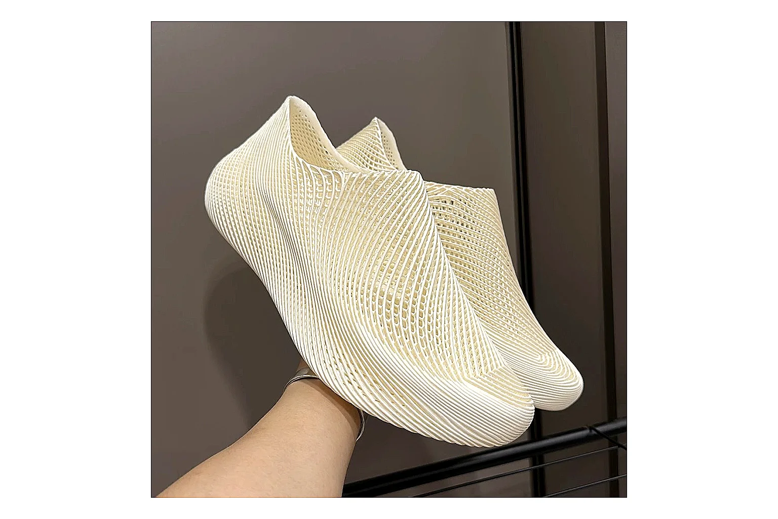 Other 4D Printed Cream Slip-On Sneakers QC reference photo showing cream open-grid upper, seamless slip-on profile, sculpted sole, and soft futuristic casual shape thumbnail 6