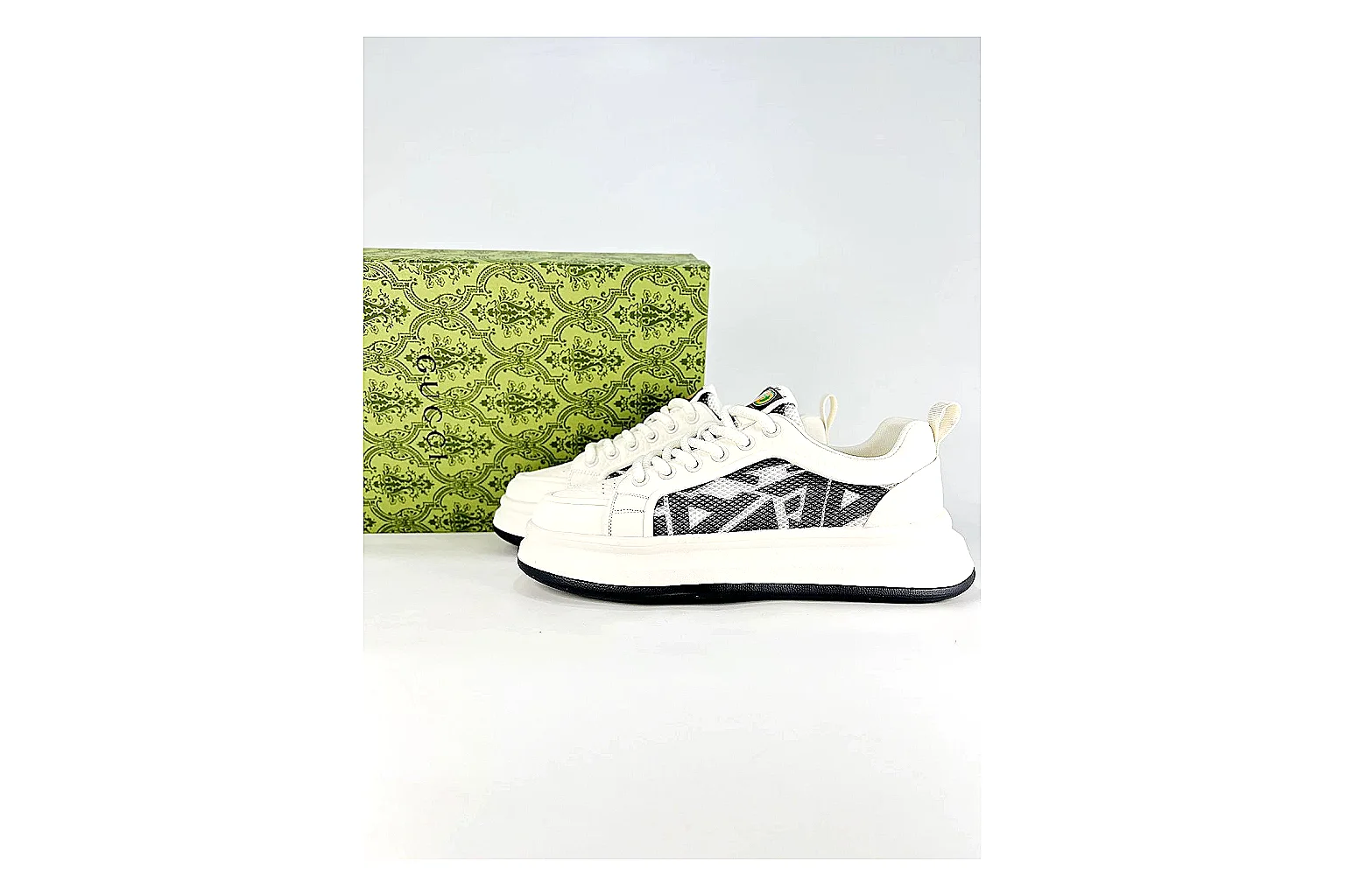 Low Runner White Black Sneaker QC reference photo showing white black synthetic low-top upper, minimal runner shape, clean panels, and casual sole