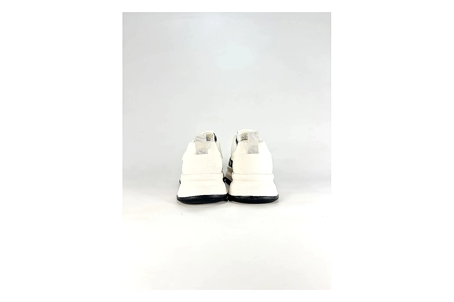 Low Runner White Black Sneaker QC reference photo showing white black synthetic low-top upper, minimal runner shape, clean panels, and casual sole thumbnail 3
