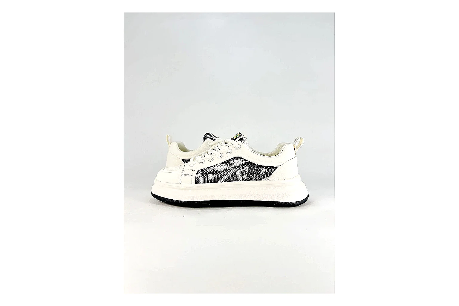 Low Runner White Black Sneaker QC reference photo showing white black synthetic low-top upper, minimal runner shape, clean panels, and casual sole thumbnail 5