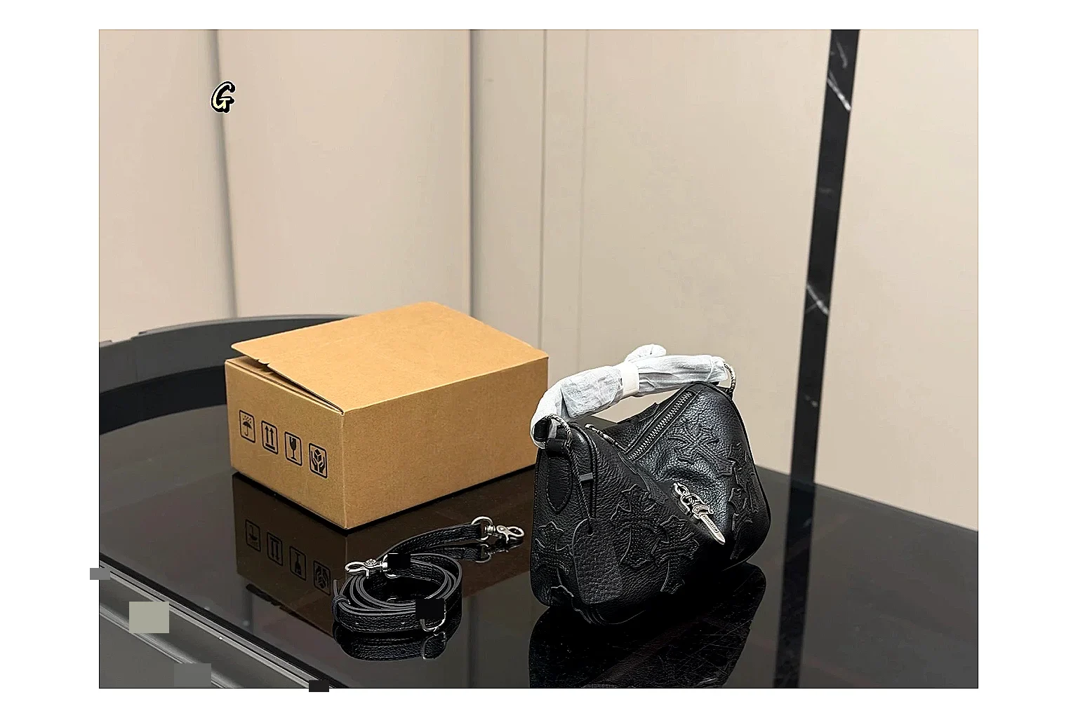 Mini Top Handle Black Bag QC reference photo showing black leather compact bag body, structured handle, clean top-handle shape, and simple hardware