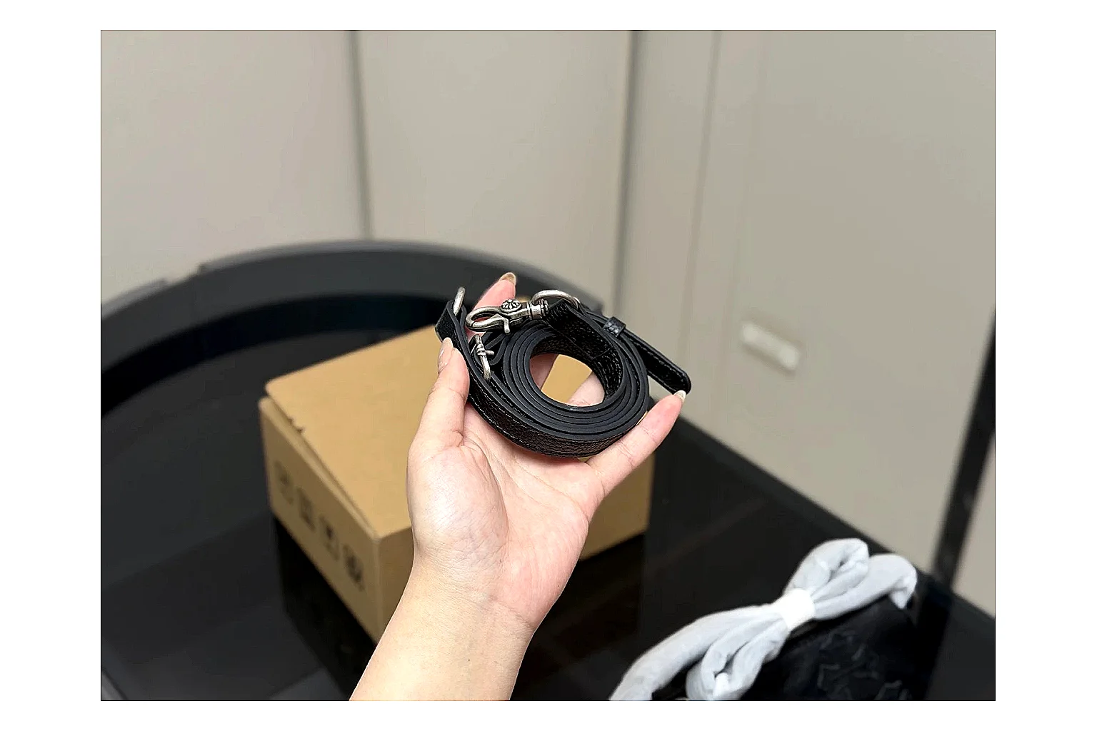 Mini Top Handle Black Bag QC reference photo showing black leather compact bag body, structured handle, clean top-handle shape, and simple hardware