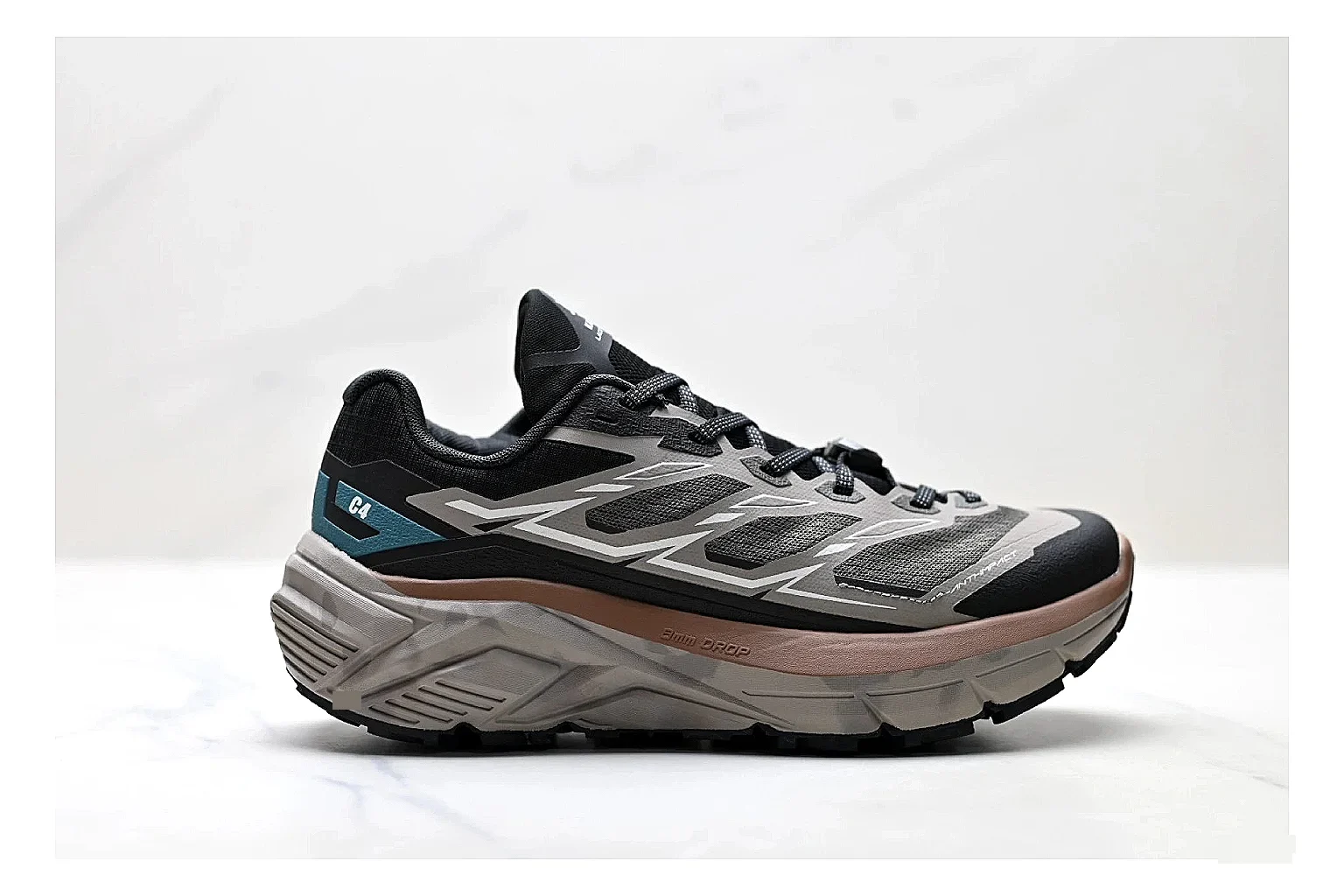 Trail Runner Black Teal Sneaker QC reference photo showing black mesh runner upper, teal accent details, rugged trail profile, and traction sole