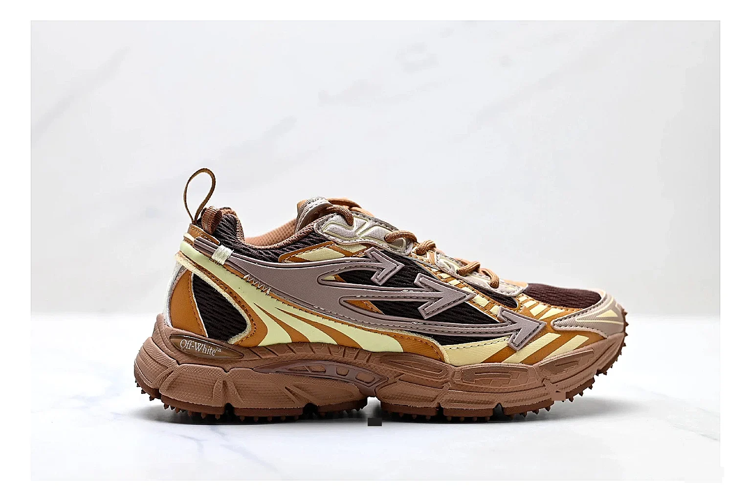 Trail Runner Brown Gold Sneaker QC reference photo showing brown gold mesh-suede runner upper, rugged trail profile, protective overlays, and traction sole