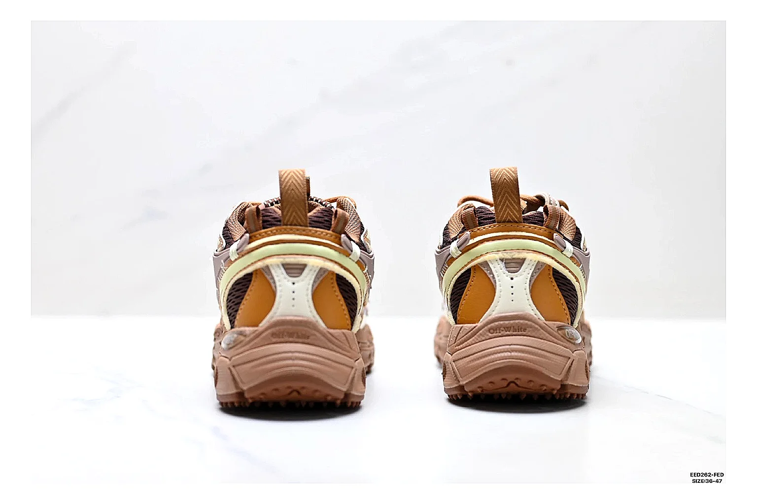 Trail Runner Brown Gold Sneaker QC reference photo showing brown gold mesh-suede runner upper, rugged trail profile, protective overlays, and traction sole
