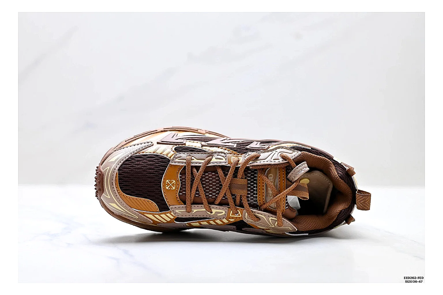 Trail Runner Brown Gold Sneaker QC reference photo showing brown gold mesh-suede runner upper, rugged trail profile, protective overlays, and traction sole thumbnail 5