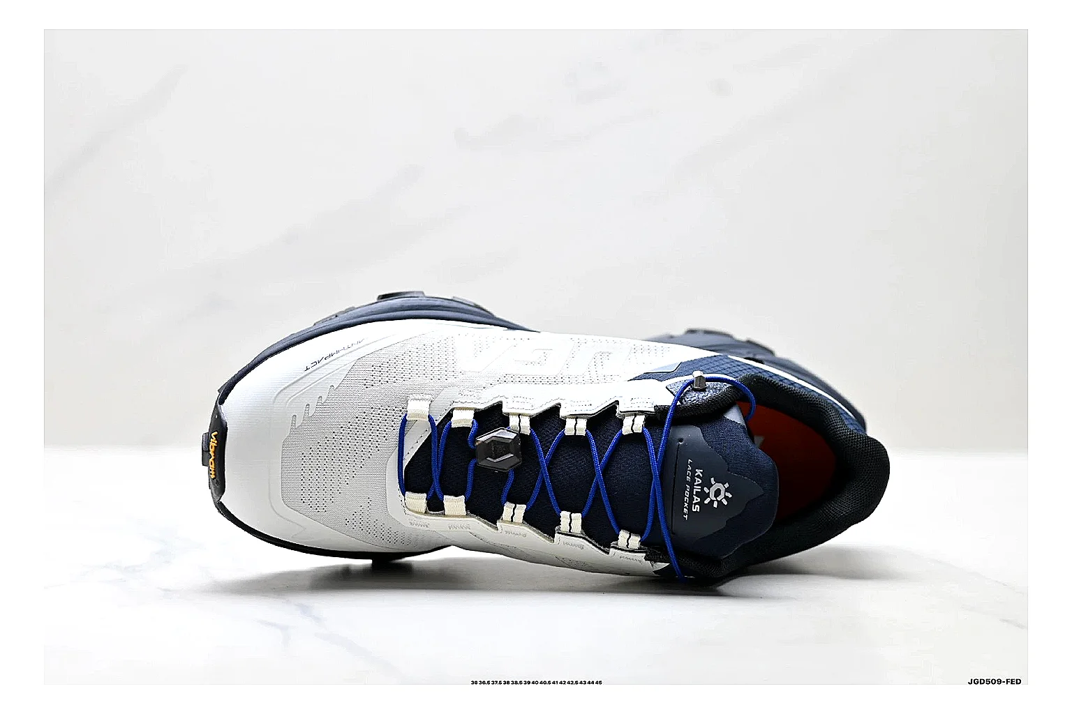 Trail Runner White Navy Sneaker QC reference photo showing white navy mesh-leather runner upper, rugged trail shape, protective overlays, and traction sole thumbnail 5