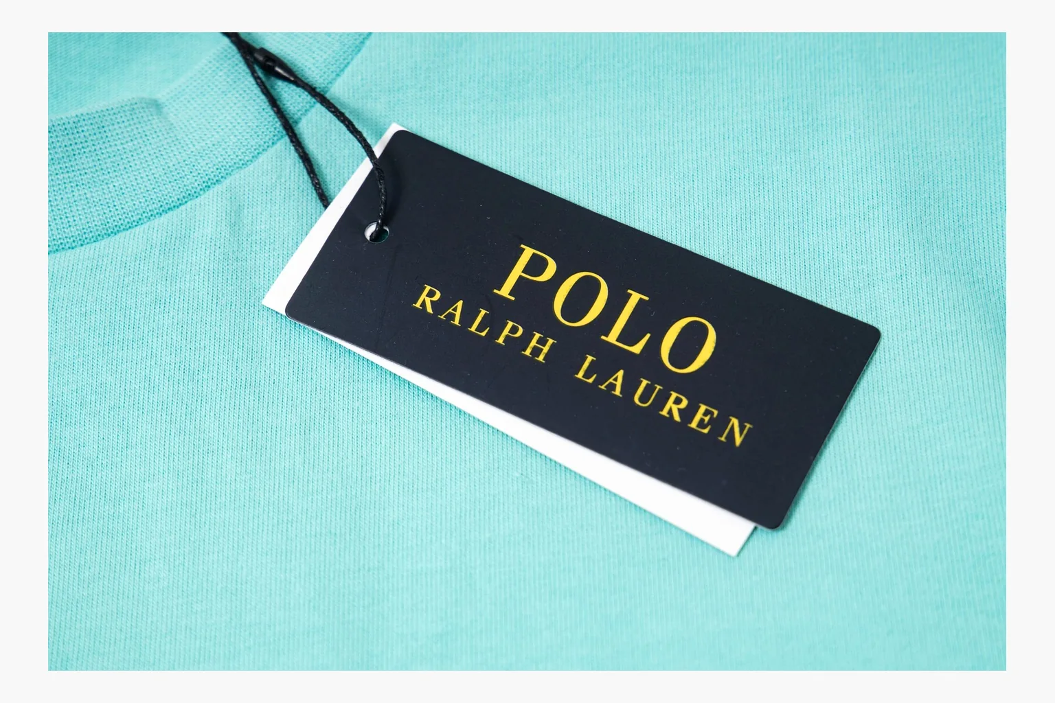 Aqua Polo pocket tee QC image showing pocket and logo thumbnail 3