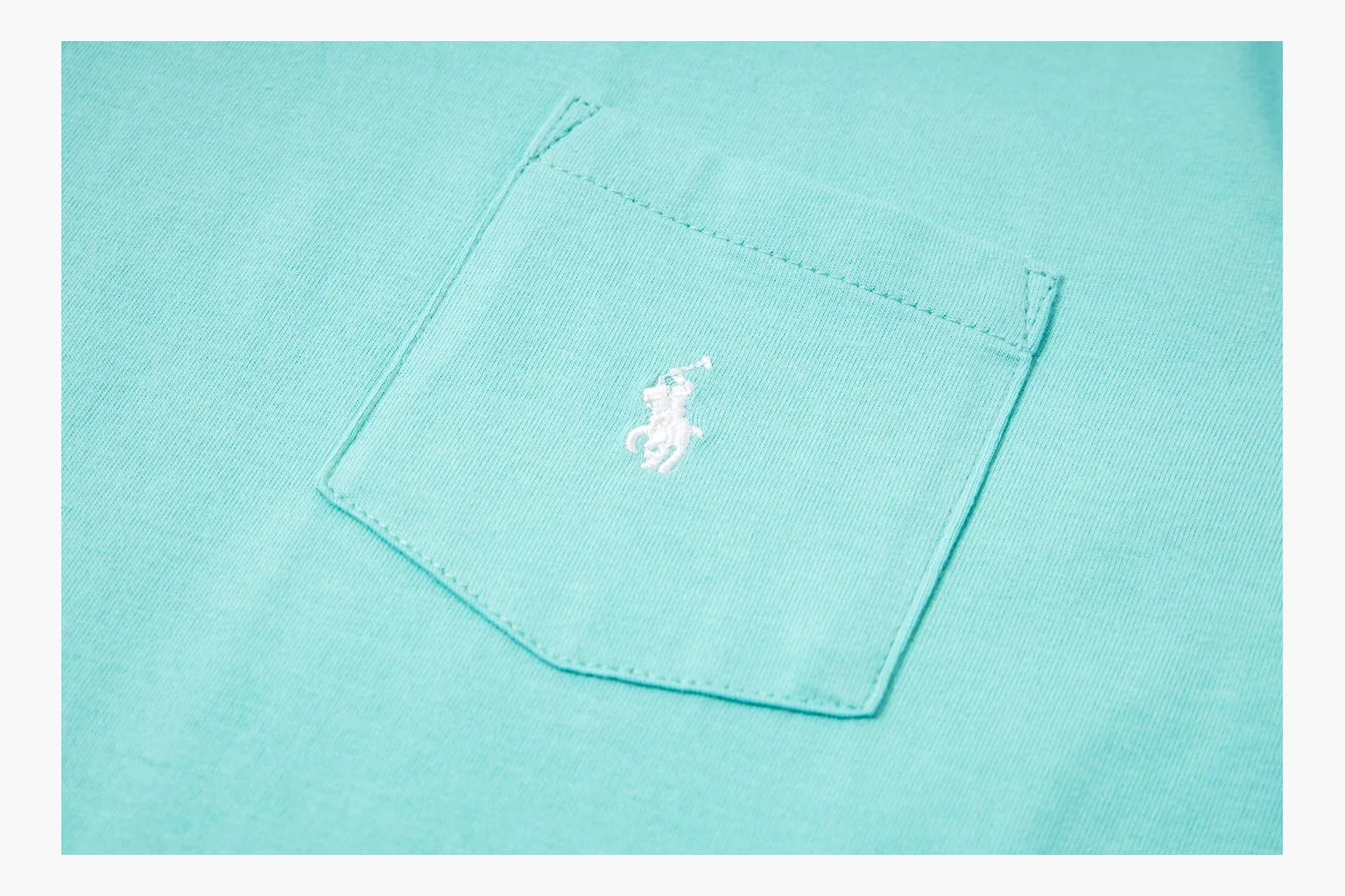 Aqua Polo pocket tee QC image showing pocket and logo thumbnail 6