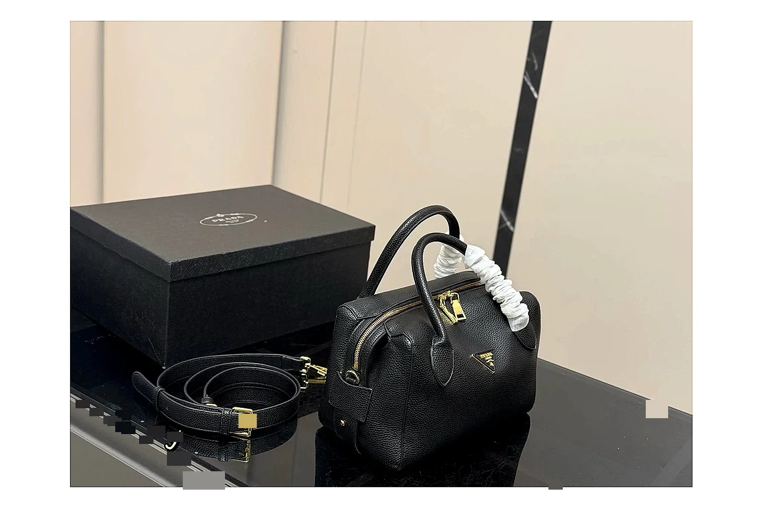 Prada Mini Top Handle Black QC reference photo showing black leather mini bag body, structured top handle, compact silhouette, and clean metal hardware