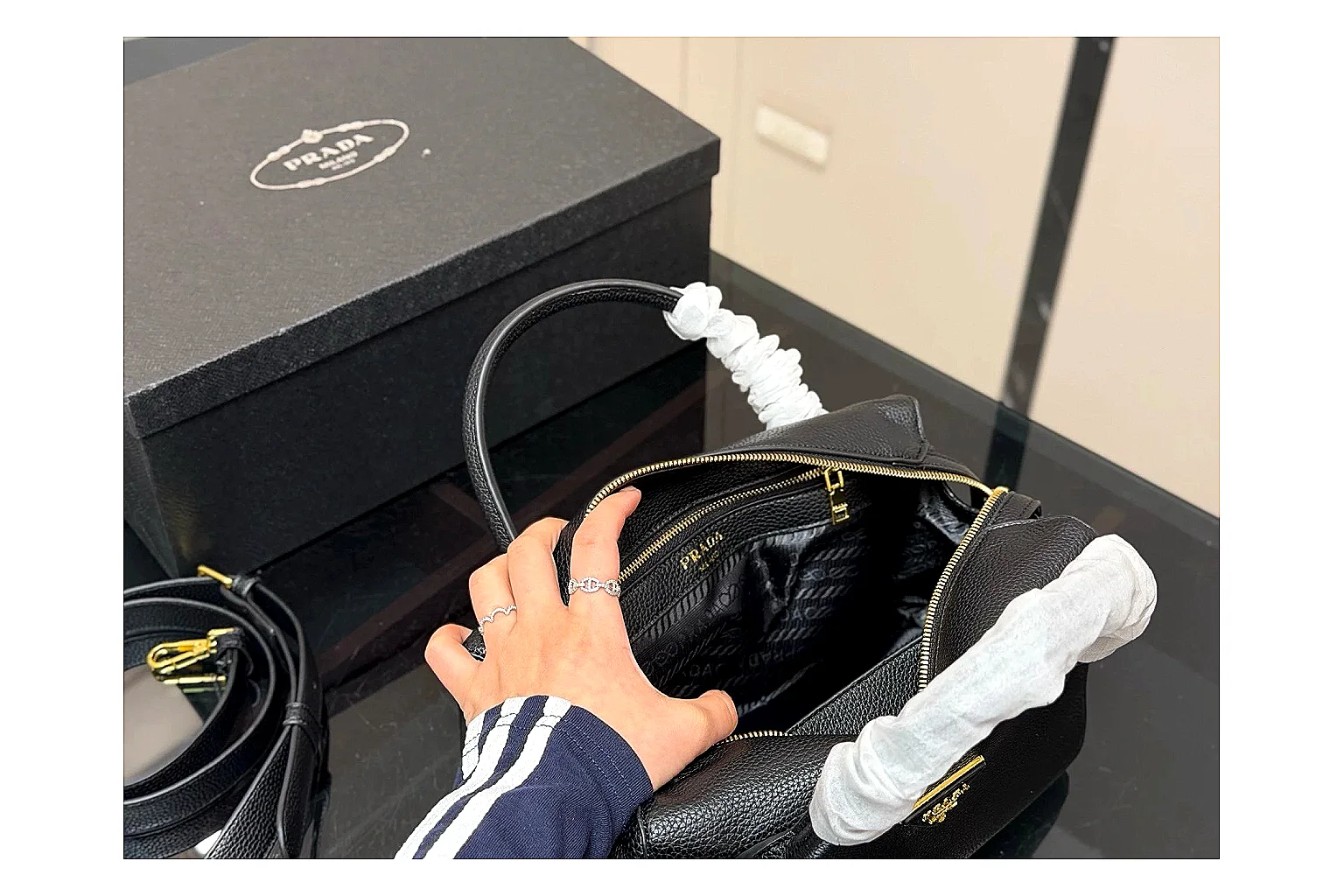 Prada Mini Top Handle Black QC reference photo showing black leather mini bag body, structured top handle, compact silhouette, and clean metal hardware thumbnail 3