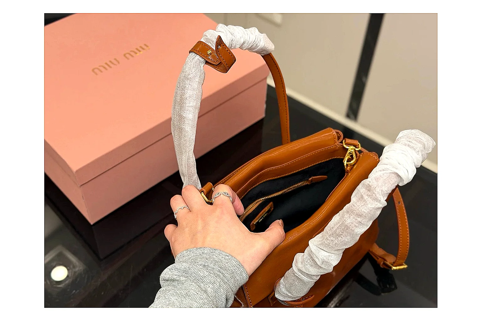 Prada Mini Top Handle Orange Brown QC reference photo showing orange brown leather mini bag body, structured top handle, compact shape, and clean hardware details thumbnail 3